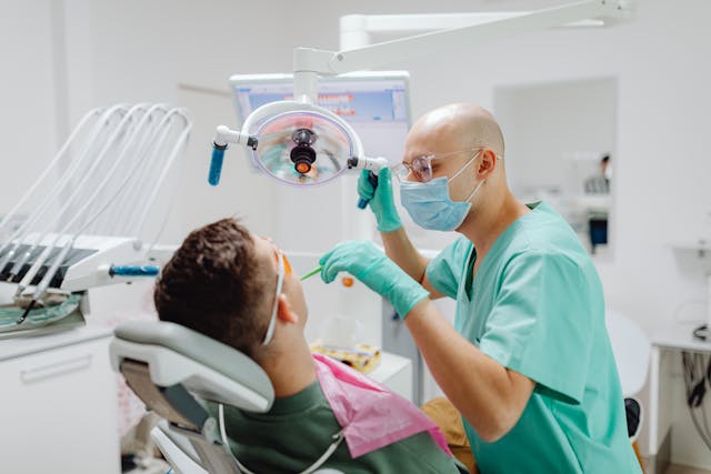 Adult professional showing confident smile after treatment