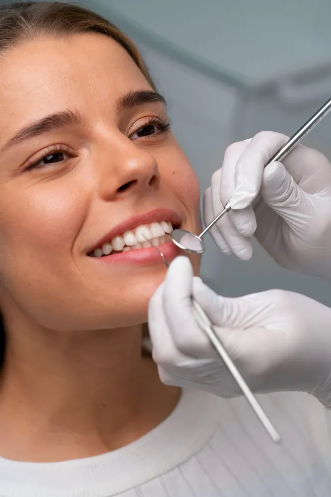 Dental implant planning model showing implant posts and final teeth